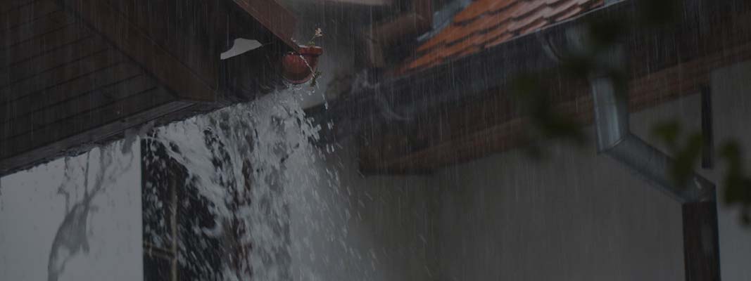 Rain Causing Damage because the building needs gutters